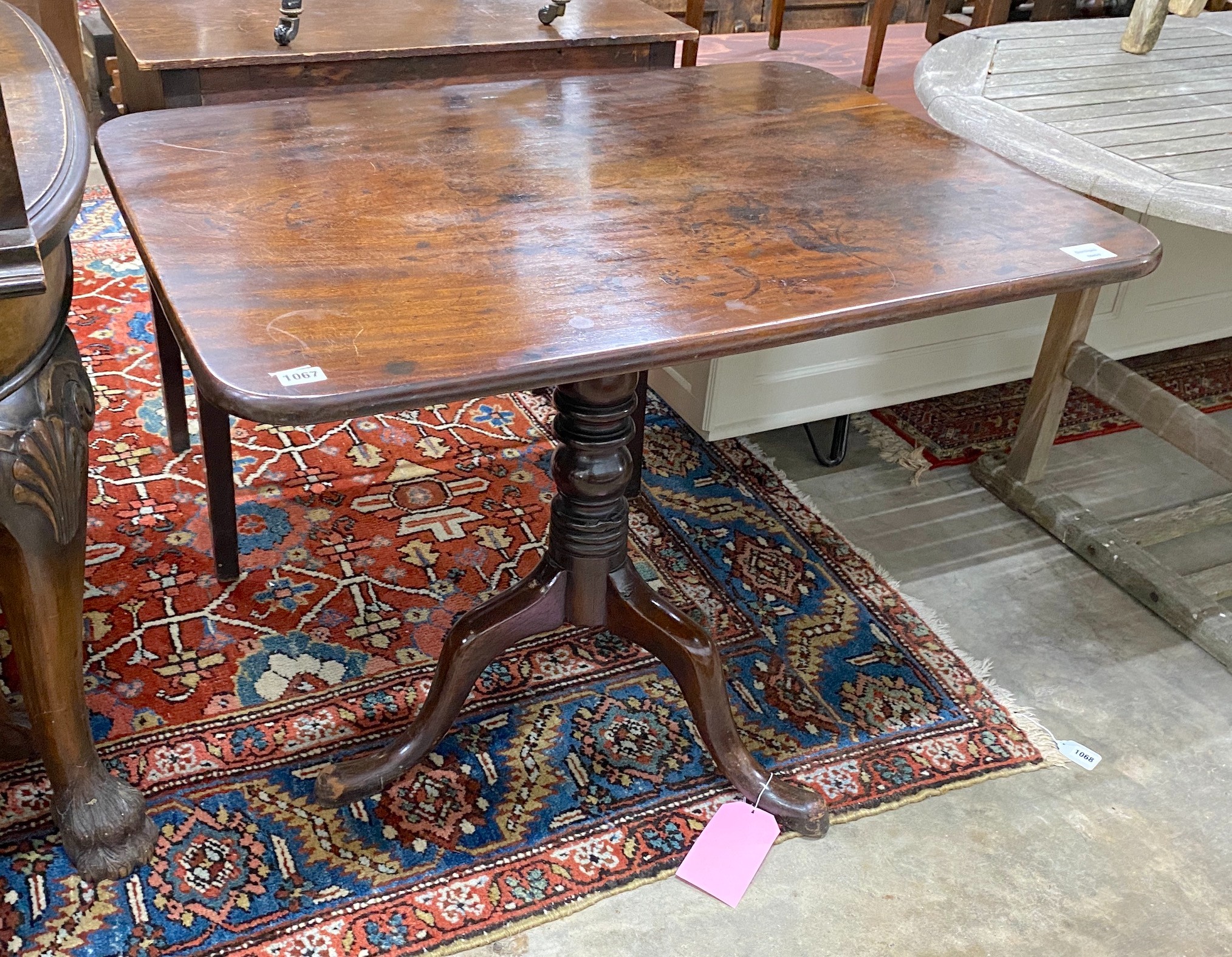 A George III mahogany rectangular tilt top tea table, width 90cm, depth 69cm, height 72cm